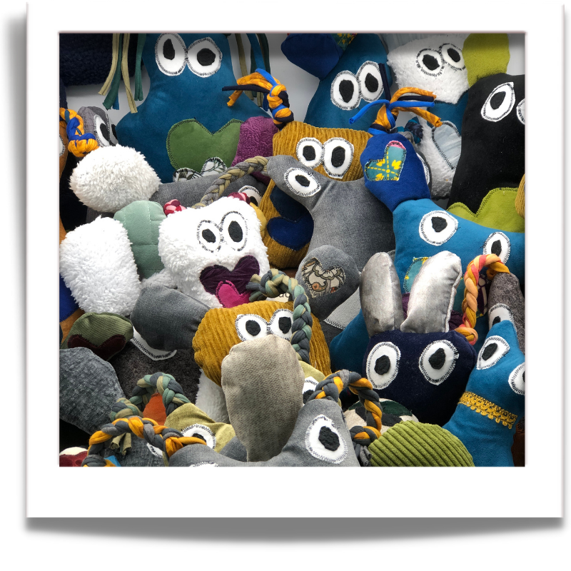 A selection of fuGLy friENds made from reclaimed fabrics, demonstrating that no two upcycled plush toys are ever the same.